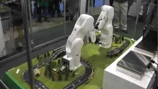 Robot Movement Coordination. Laying Slot Car Track for Super Mario's Drive!