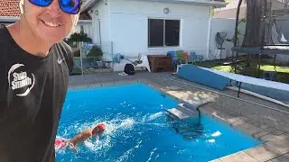 Byron Kimber in an Endless Pool  with a parachute at 1:14/100m