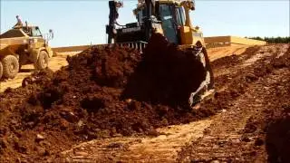 CAT D8T BULLDOZER PUSHING DOWNHILL