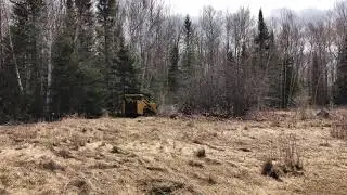 Removing brush at the Cornucopia WI airport