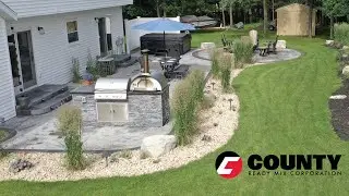 Back Yard Oasis Showcases Stamped Colored Concrete Design