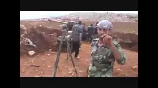 FSA terrorists get in position to shell pro-Assad village 31-10-12