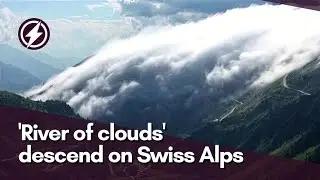 'River of clouds' descend on Swiss Alps in weather event