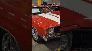 red with white stripes on this vintage Chevrolet chevelle ss