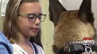 Her donation made it possible: Kenna meets K9 Rex