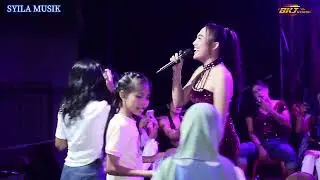 Gelas retak voc; Ajeng geol Syila musik 