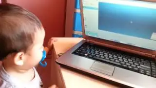 Lorenz excited about calling Daddy on Skype -  20130406