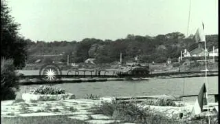 Tanks of the US 3rd Armored Division move across a pontoon bridge in France durin...HD Stock Footage