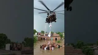 Army Helicopter Rescues Stranded Villagers and Delivers Rations in Raging Flood