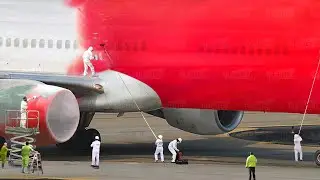 The Hypnotic Process of Manually Repainting Gigantic Airliners