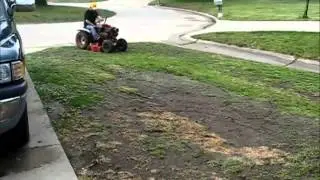 753 wheel horse cutting grass