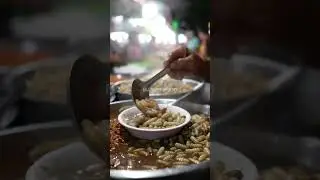 Sago Worm Cuisine: A High-Protein Delight from Asia's Bustling Street Markets.@darmawanfood-ai