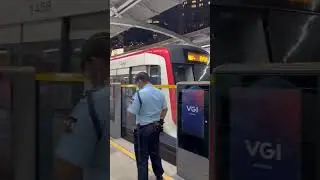 There are security guards at every station BTS SKY TRAIN Bangkok Thailand