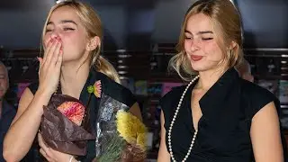 Addison Rae signs copies of her W magazine cover for fans
