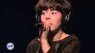 Purity Ring performing 