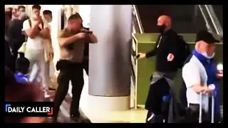 Officer Brandishes Gun During Brawl In Miami Airport