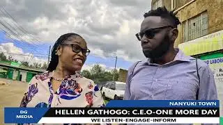 Хеллен Гатого выступает с речью о дискриминации в торговом центре Nanyuki Cedar Mall Gate