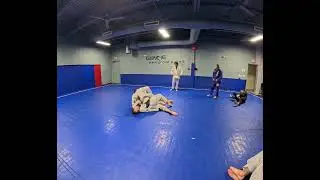 Escape bottom side control technique when back is to you