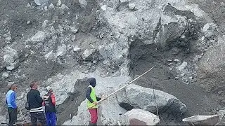 Dropping Chunks of Sand on The Cliff on The Right  