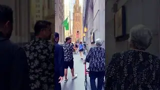 Strolling Down Wall Street Towards Trinity Church 🌆🚶&zwj;♀️🌆 #nyc #walking #wallstreet #trinitychurch