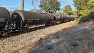 CSX 5491 and CSX 3183 lead a Saturday evening mixed freight train south bound 1/11/2025 