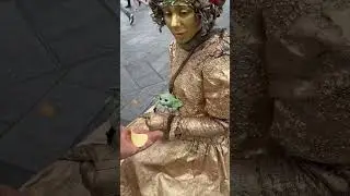 Gold Lady against wind in London #performer #shortsviral #statue #livingstatue #goldlady #goldenlady