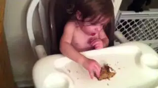 Natalie eating cake.