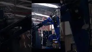 YASKAWA WELDING ROBOT & TORCH CLEANING STATION