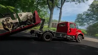 Hook Lift Truck Makes Equipment Transport EASY!