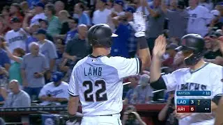 Lamb drills a go-ahead grand slam to right
