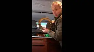 Campervan conversion, installing windows and portholes in the bulkhead.