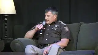 Pastoral Conversation with the Sheriff