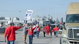 UAW workers strike outside Ford Michigan Assembly Plant