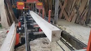 Cutting up a Hickory log into a post on the Timberking sawmill