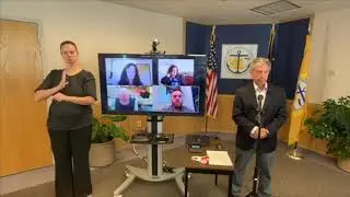 Mayor Ethan Berkowitz exits left when asked why he isn't enforcing his mandates against churches.