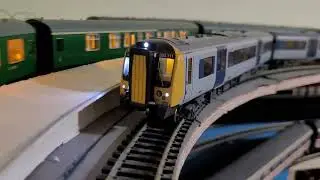 9 Trains running on my layout with iTrain Software