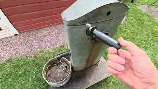 Hand well pump set up to recirculate water.  ( Butterfield.  )