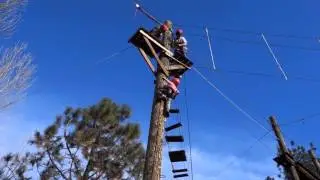 X-Boy climbs a pole and rides the zip line at Pine Valley...
