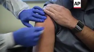 AP Exclusive: COVID-19 vaccine test gets underway