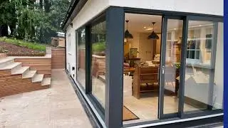 Roseview Sash, Sheerline Aluminium Lift and Slide Patio & Spitfire Aluminium Composite Doors