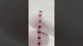 Lot 115: 14kt White Gold 5.50ctw Diamond Ruby Tennis Bracelet
