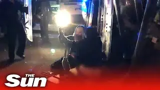 Kill The Bill riot - Female protester urinates at police officers' feet in shocking scenes