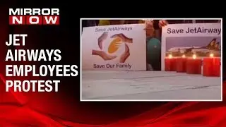Jet Airways employees take out candle march near Jantar Mantar