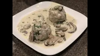 Pretzel Dumplings (Brezelkn&ouml;del) with a creamy Mushroom gravy
