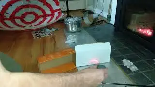 Weird reflections!  Laser testing materials for solar cooker reflector.  How can we fix it?