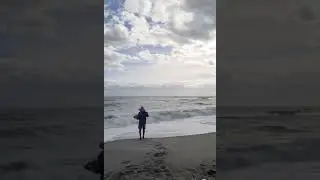 Giant redfish catch and release at Melbourne Beach in topical storm conditions, tight lines!