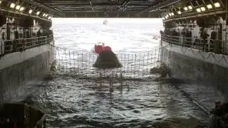 Orion capsule reeled into the USS Anchorage