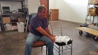 Covering a chair pad with a sham cover