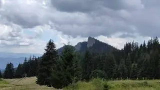 Sokolitsa mountain rock from afar- wild nature forest and meadows in Bulgaria 2025- to Smolyan City