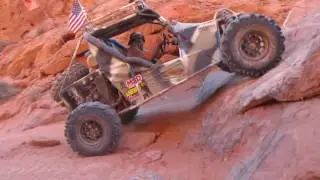 Joyner 650 custom...going up a 2 meter rock wall...